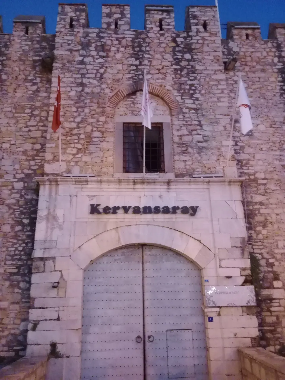 Öküz Mehmed Pasha Caravanserai door with flags
